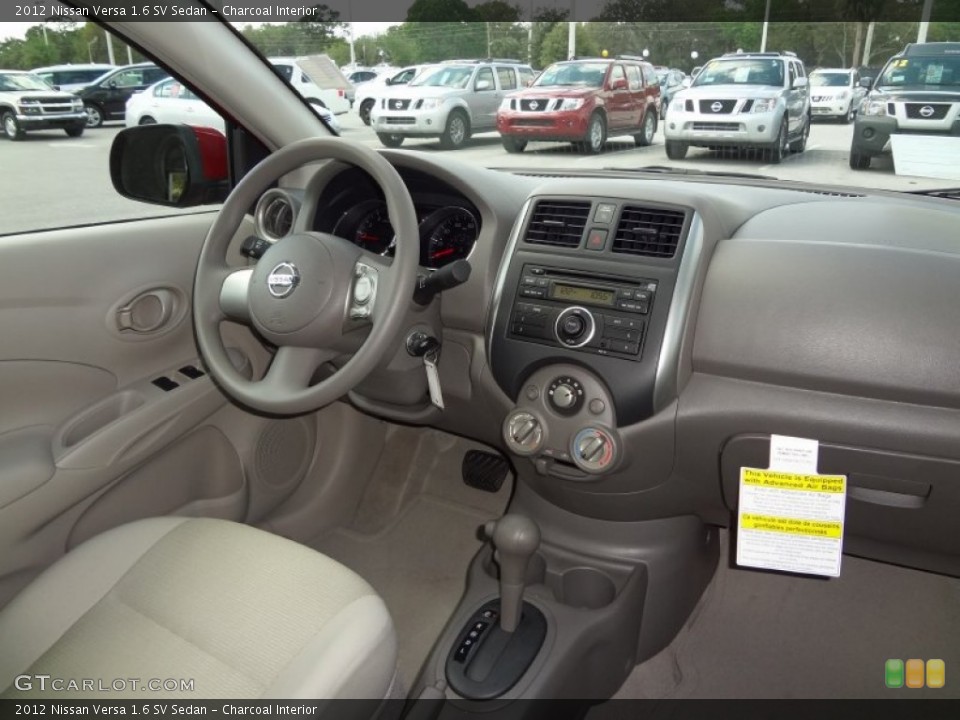 Charcoal Interior Dashboard for the 2012 Nissan Versa 1.6 SV Sedan #62309765