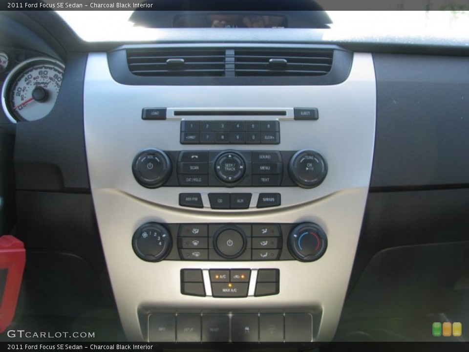 Charcoal Black Interior Controls for the 2011 Ford Focus SE Sedan #62334792