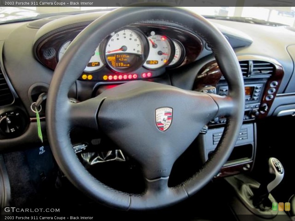 Black Interior Steering Wheel for the 2003 Porsche 911 Carrera Coupe #62339465