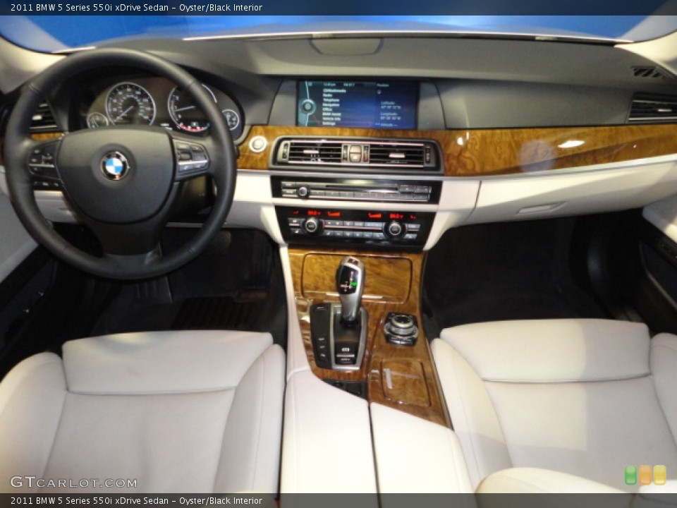 Oyster/Black Interior Dashboard for the 2011 BMW 5 Series 550i xDrive Sedan #62351543