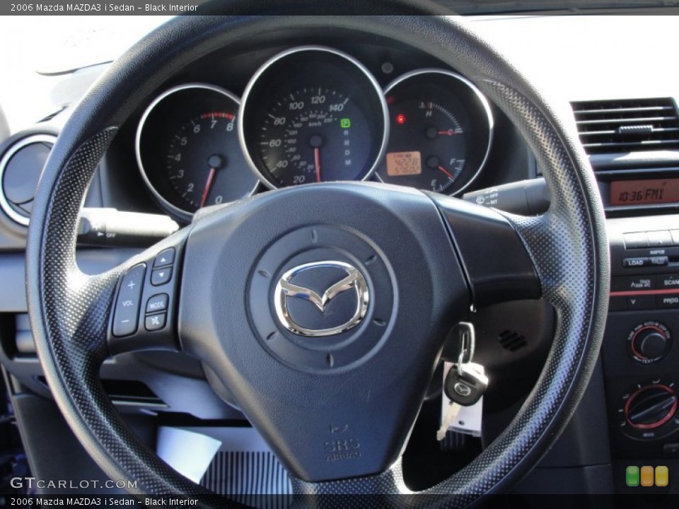Black Interior Steering Wheel for the 2006 Mazda MAZDA3 i Sedan #62362446
