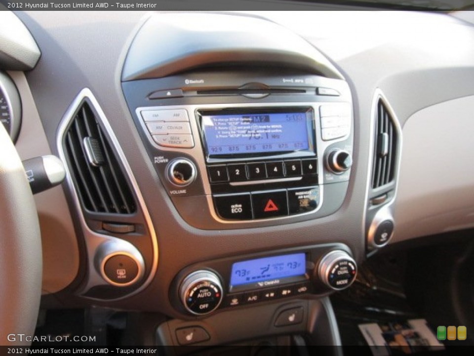 Taupe Interior Controls for the 2012 Hyundai Tucson Limited AWD #62363733