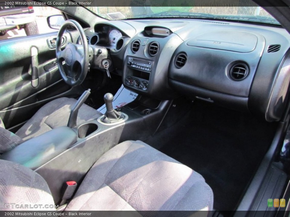 Black Interior Dashboard for the 2002 Mitsubishi Eclipse GS Coupe #62384676