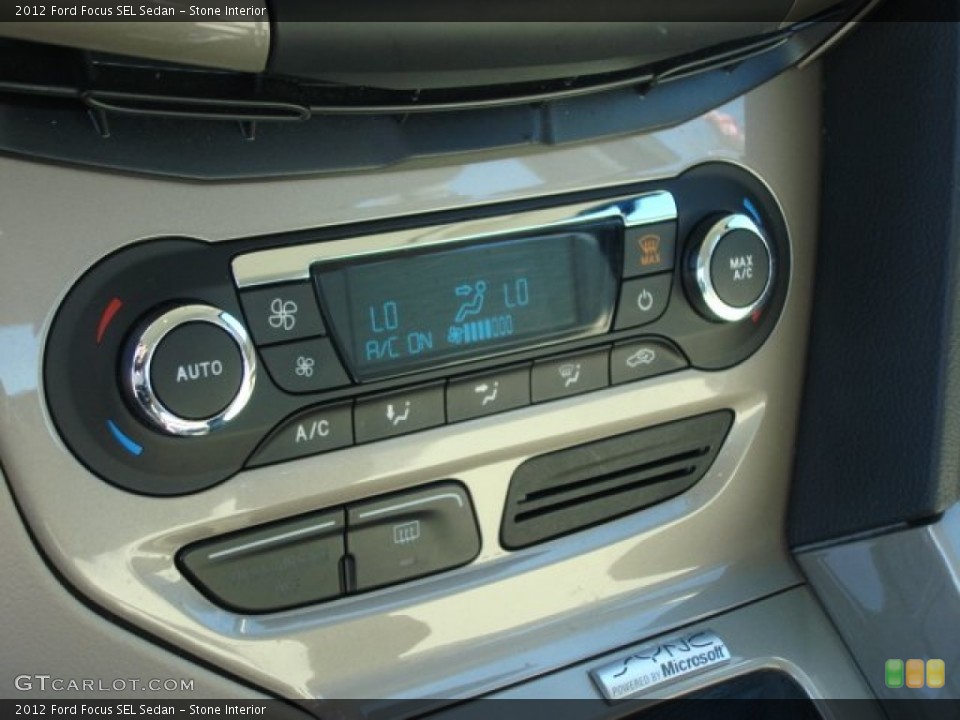 Stone Interior Controls for the 2012 Ford Focus SEL Sedan #62406576