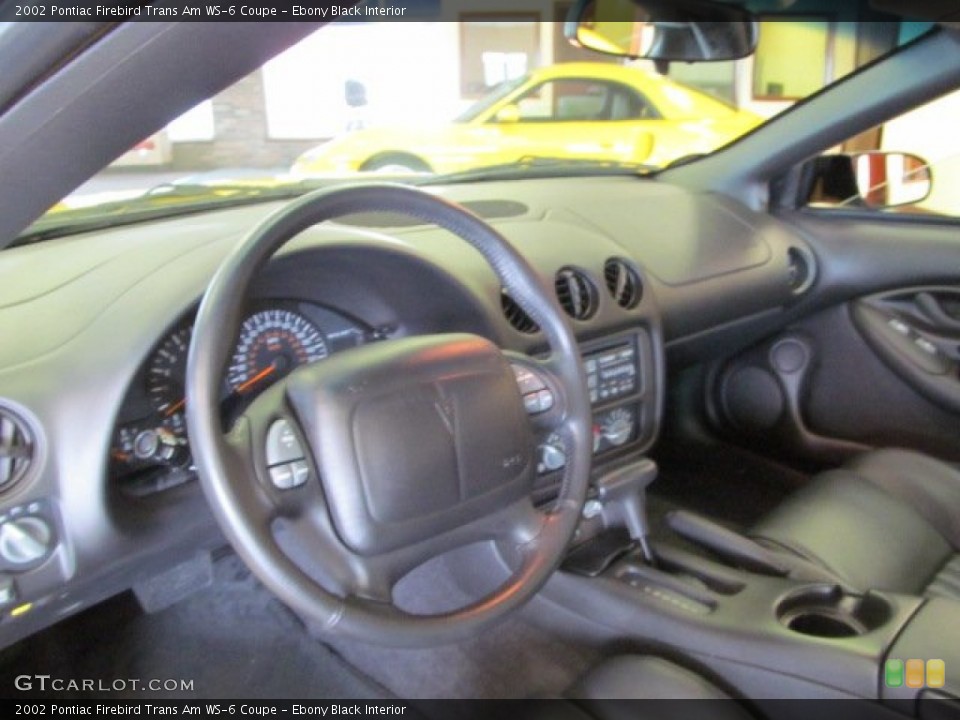 Ebony Black Interior Dashboard for the 2002 Pontiac Firebird Trans Am WS-6 Coupe #62469613