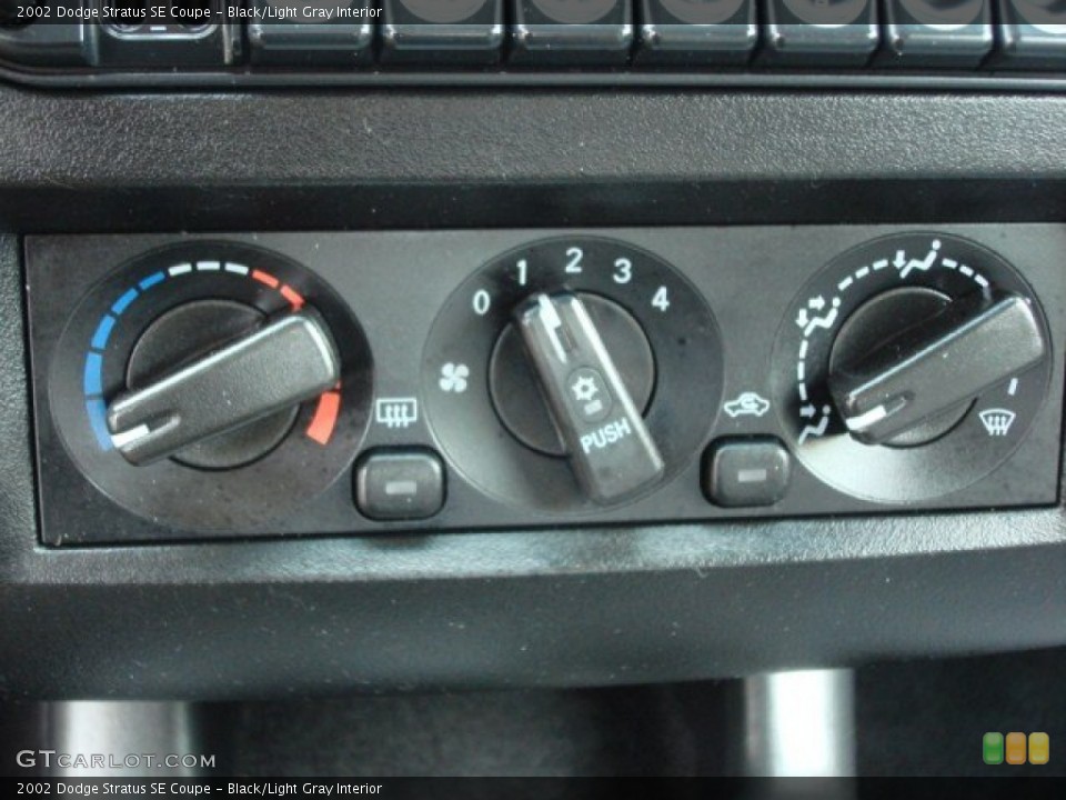 Black/Light Gray Interior Controls for the 2002 Dodge Stratus SE Coupe #62522604