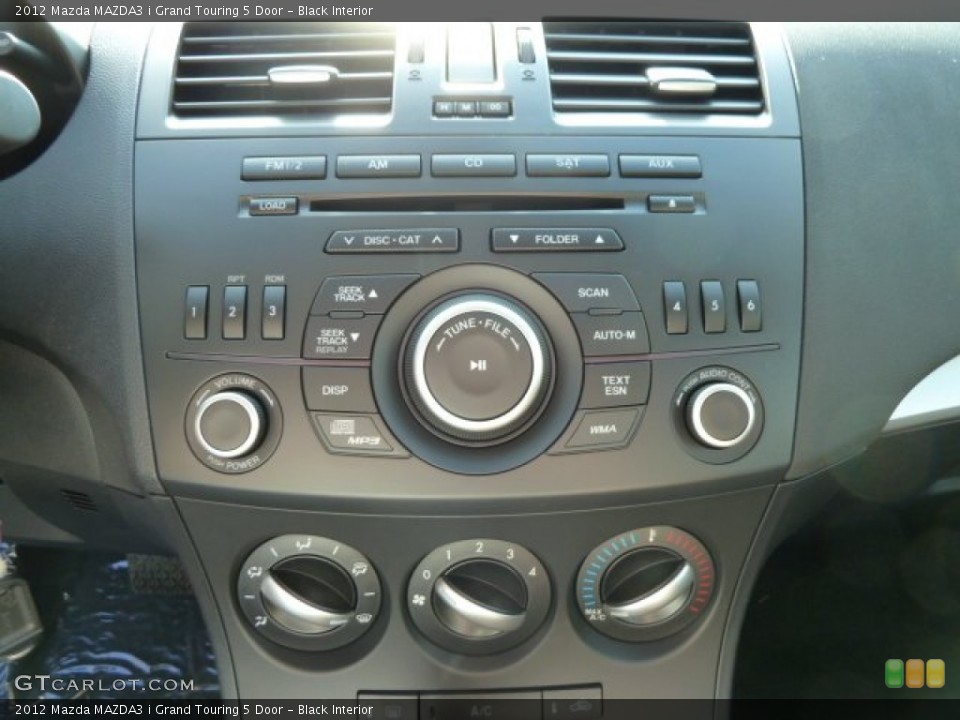 Black Interior Controls for the 2012 Mazda MAZDA3 i Grand Touring 5 Door #62531884