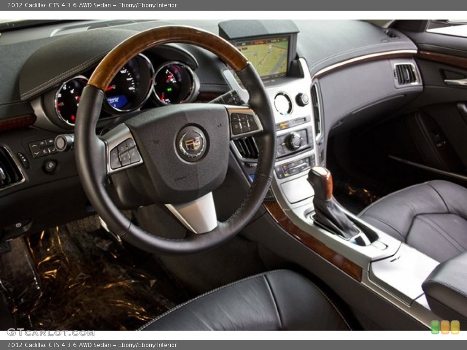 Ebony/Ebony Interior Dashboard for the 2012 Cadillac CTS 4 3.6 AWD Sedan #62543719