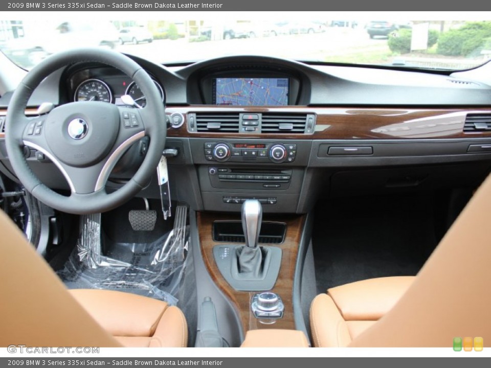 Saddle Brown Dakota Leather Interior Dashboard for the 2009 BMW 3 Series 335xi Sedan #62607725