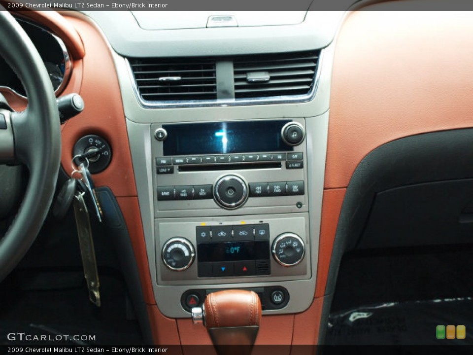 Ebony/Brick Interior Controls for the 2009 Chevrolet Malibu LTZ Sedan #62683496