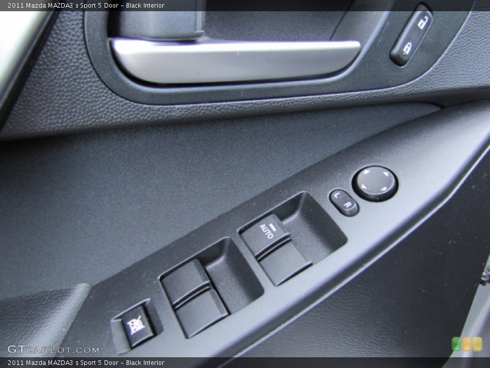 Black Interior Controls for the 2011 Mazda MAZDA3 s Sport 5 Door #62686109