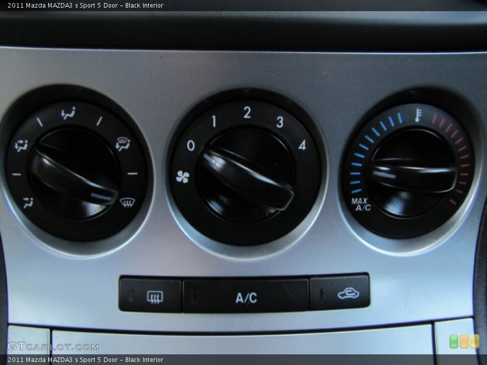 Black Interior Controls for the 2011 Mazda MAZDA3 s Sport 5 Door #62686150