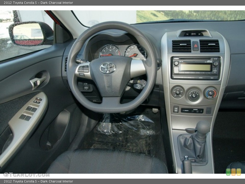 Dark Charcoal Interior Dashboard for the 2012 Toyota Corolla S #62698076