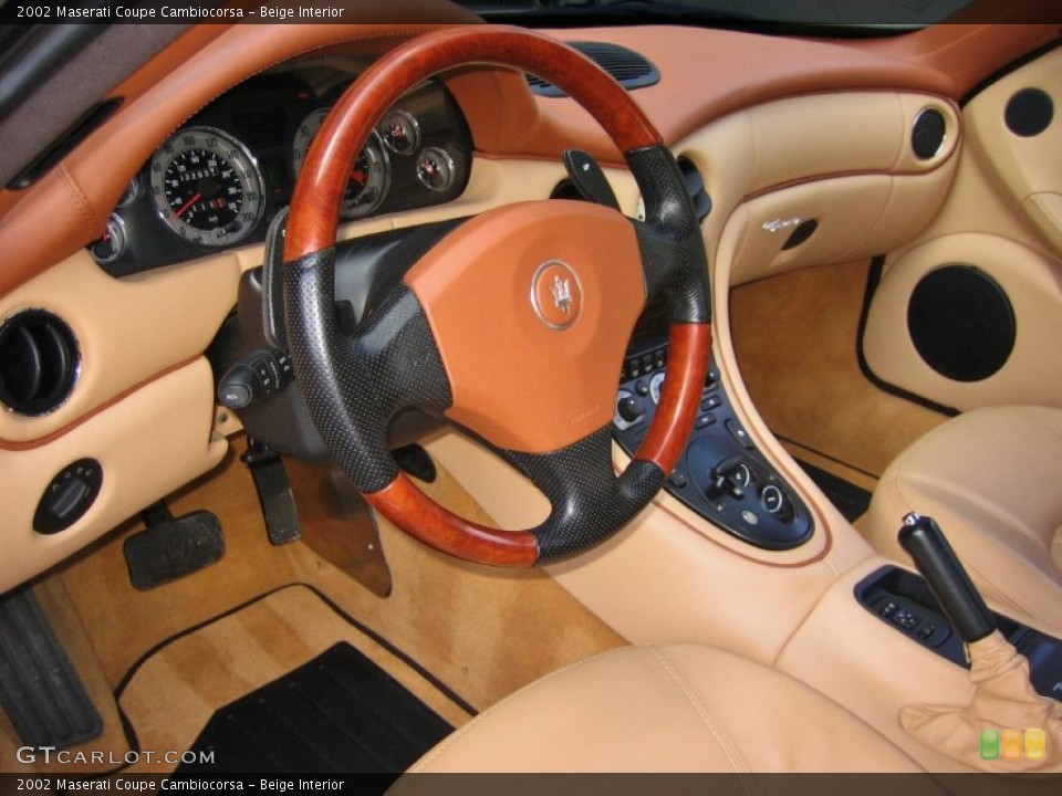 Beige Interior Dashboard for the 2002 Maserati Coupe Cambiocorsa #62698541