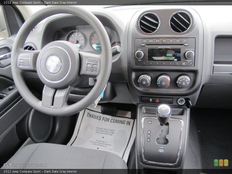 Dark Slate Gray Interior Dashboard for the 2012 Jeep Compass Sport #62725285