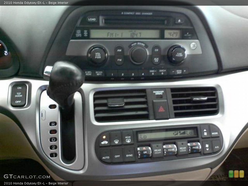 Beige Interior Controls for the 2010 Honda Odyssey EX-L #62769623