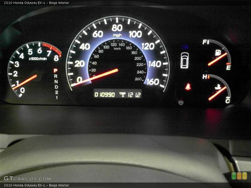 Beige Interior Gauges for the 2010 Honda Odyssey EX-L #62769632