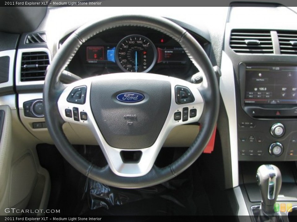 Medium Light Stone Interior Steering Wheel for the 2011 Ford Explorer XLT #62771088