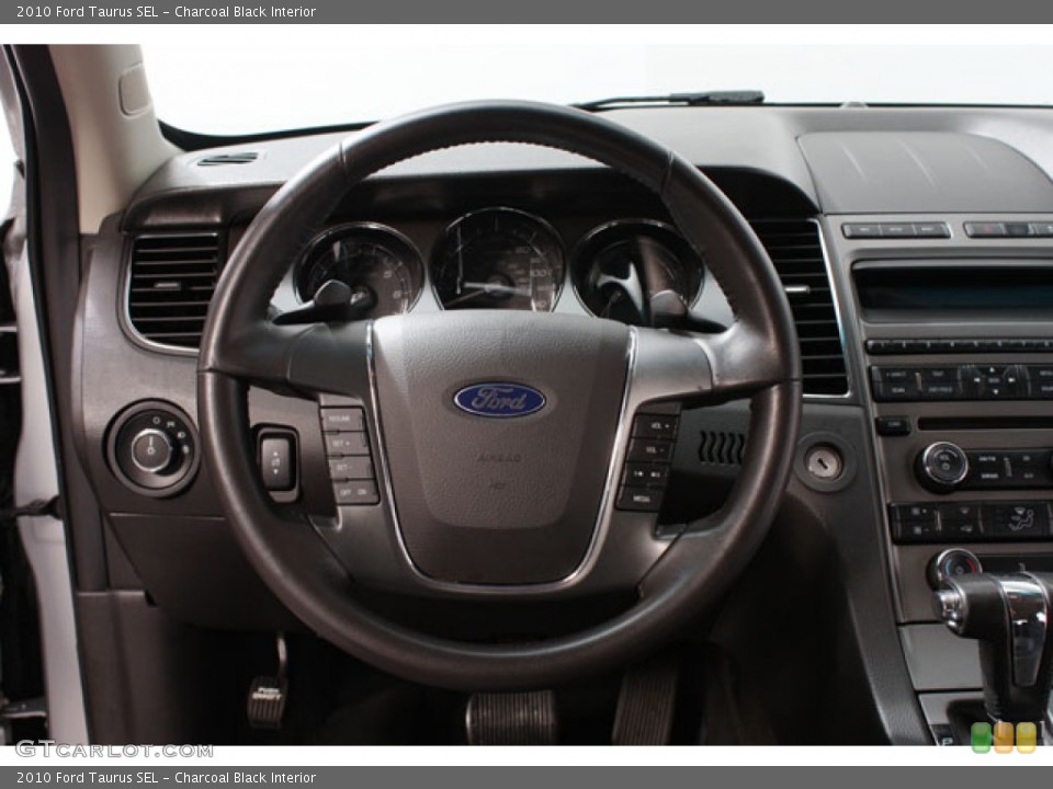 Charcoal Black Interior Steering Wheel for the 2010 Ford Taurus SEL #62794354