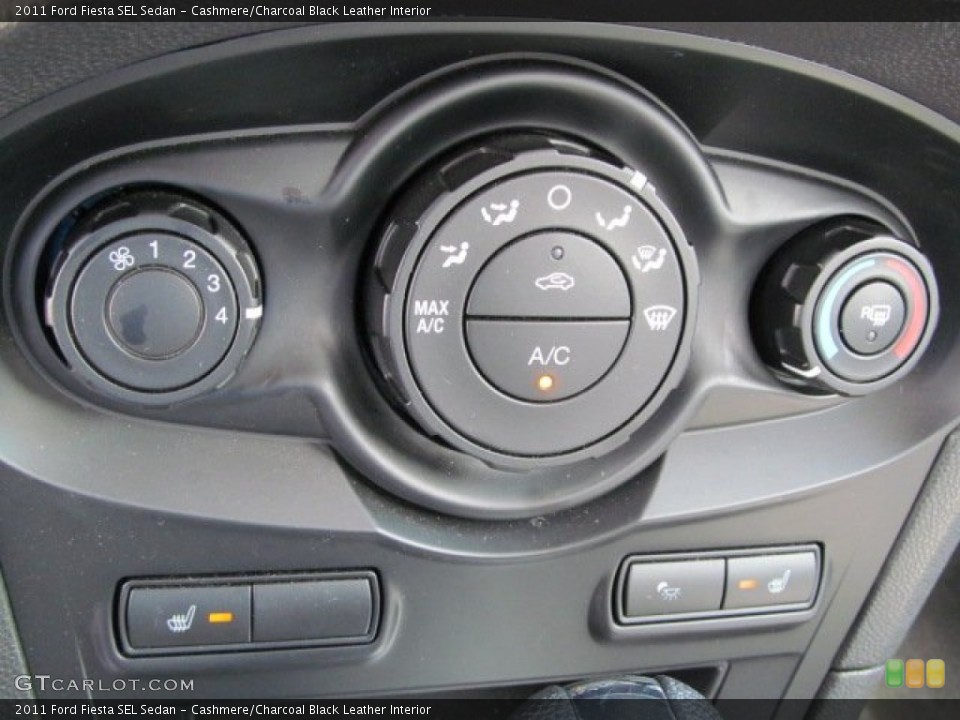 Cashmere/Charcoal Black Leather Interior Controls for the 2011 Ford Fiesta SEL Sedan #62817112