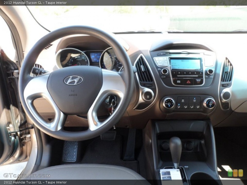 Taupe Interior Dashboard for the 2012 Hyundai Tucson GL #62822755