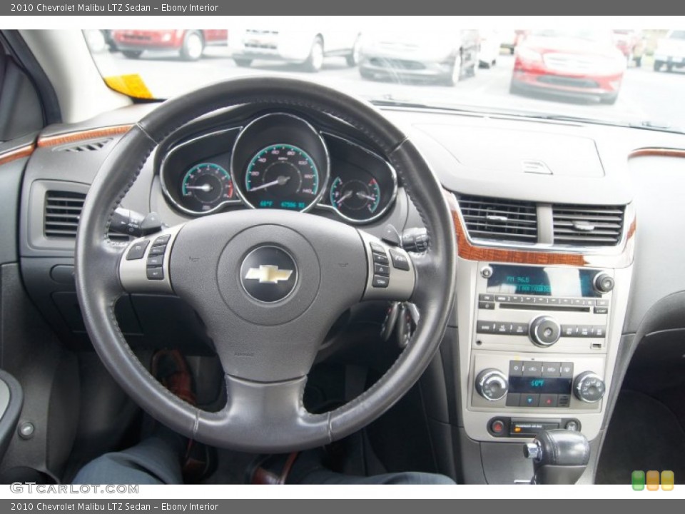 Ebony Interior Steering Wheel for the 2010 Chevrolet Malibu LTZ Sedan #62836449