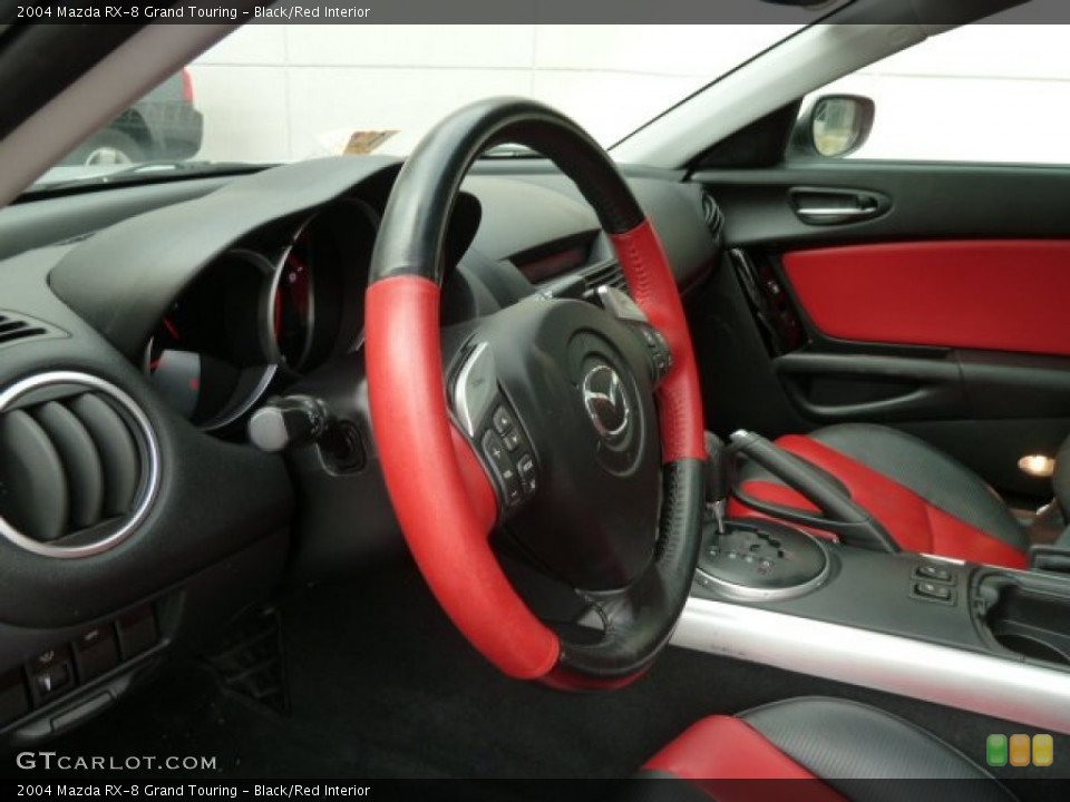 Black/Red Interior Photo for the 2004 Mazda RX-8 Grand Touring #62866642
