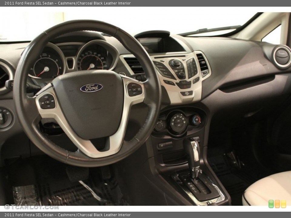 Cashmere/Charcoal Black Leather Interior Dashboard for the 2011 Ford Fiesta SEL Sedan #62866700