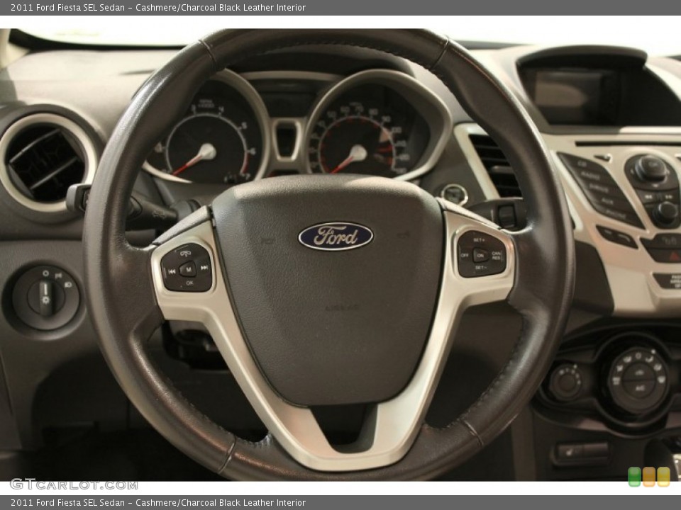 Cashmere/Charcoal Black Leather Interior Steering Wheel for the 2011 Ford Fiesta SEL Sedan #62866709