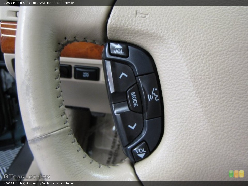 Latte Interior Controls for the 2003 Infiniti Q 45 Luxury Sedan #62890112