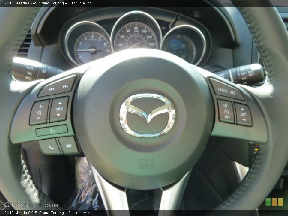 Black Interior Steering Wheel for the 2013 Mazda CX-5 Grand Touring #62903354