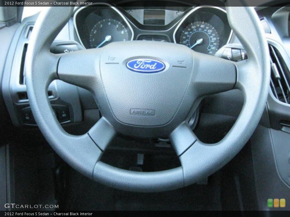 Charcoal Black Interior Steering Wheel for the 2012 Ford Focus S Sedan #62915129