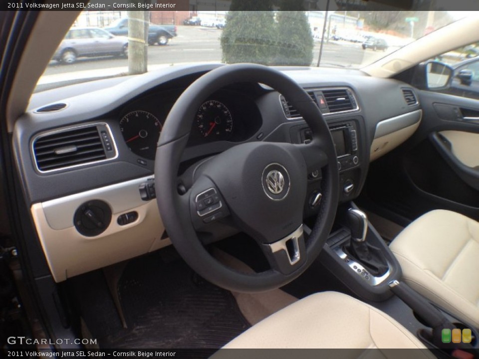 Cornsilk Beige Interior Dashboard for the 2011 Volkswagen Jetta SEL Sedan #62977829