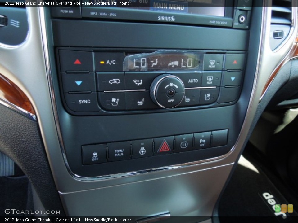 New Saddle/Black Interior Controls for the 2012 Jeep Grand Cherokee Overland 4x4 #62981279