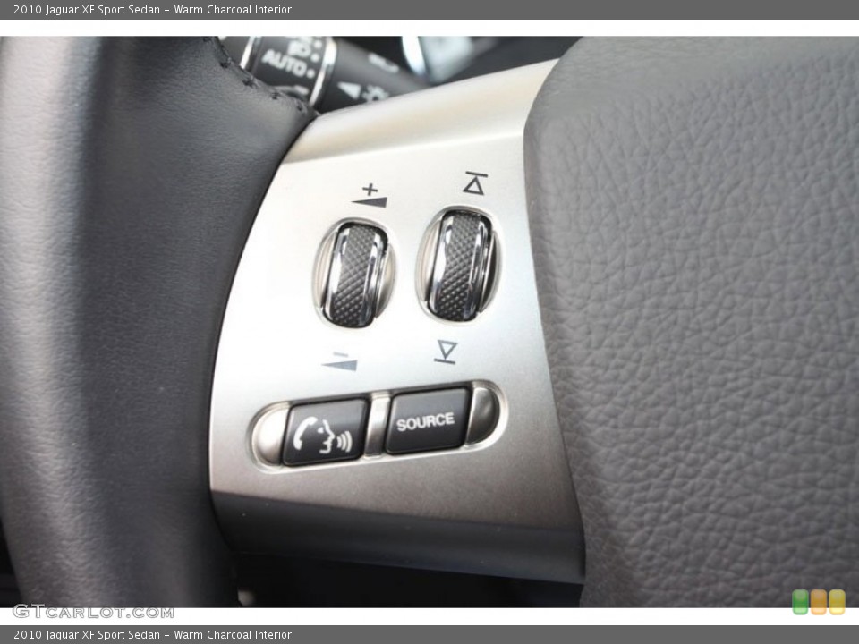 Warm Charcoal Interior Controls for the 2010 Jaguar XF Sport Sedan #63024678