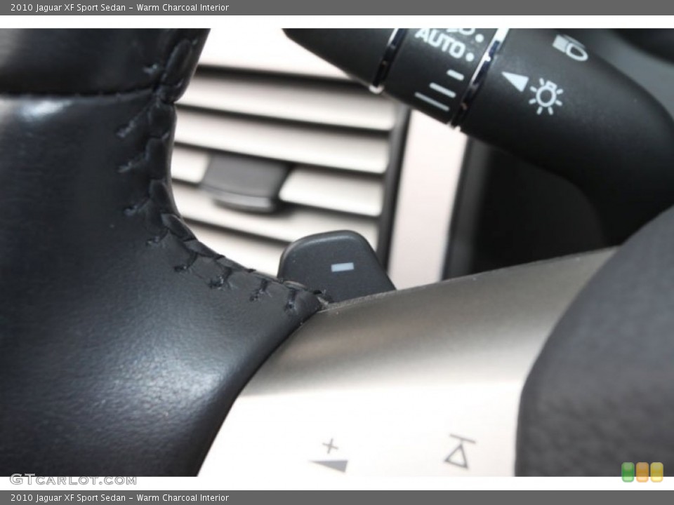 Warm Charcoal Interior Controls for the 2010 Jaguar XF Sport Sedan #63024684