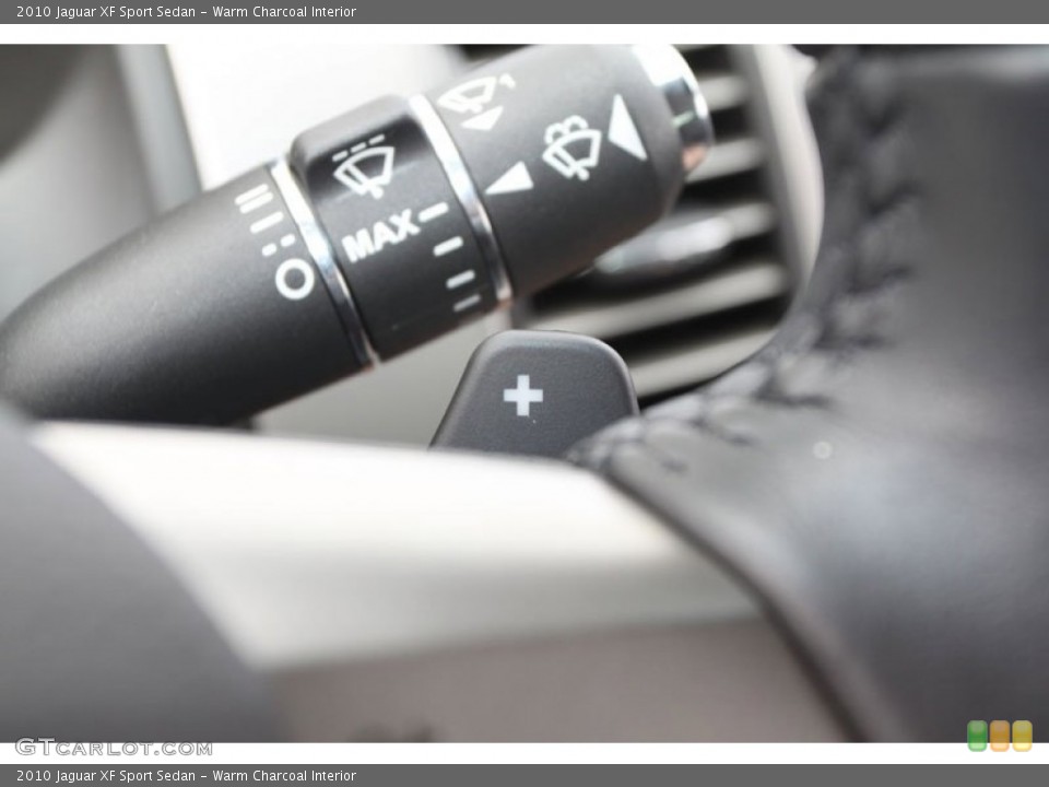 Warm Charcoal Interior Controls for the 2010 Jaguar XF Sport Sedan #63024690