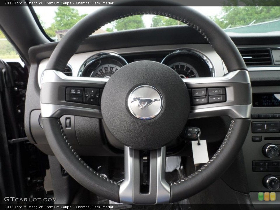 Charcoal Black Interior Steering Wheel for the 2013 Ford Mustang V6 Premium Coupe #63039202