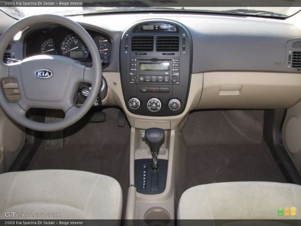 Beige Interior Dashboard for the 2009 Kia Spectra EX Sedan #63040251