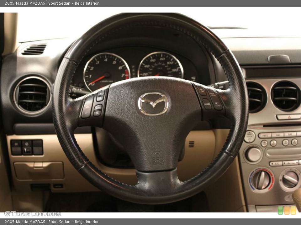 Beige Interior Steering Wheel for the 2005 Mazda MAZDA6 i Sport Sedan #63058888