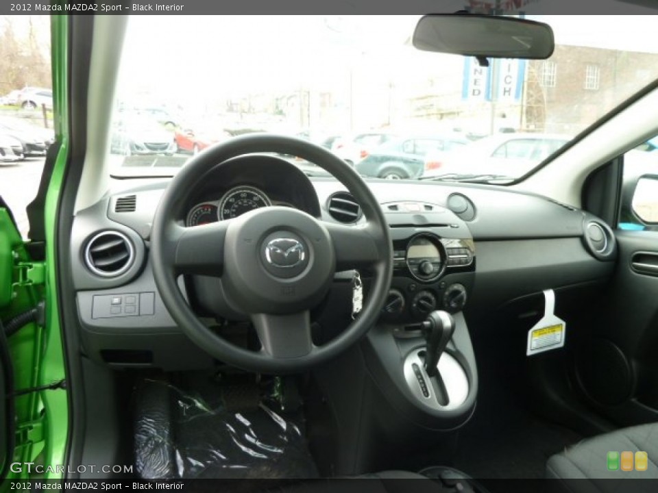 Black Interior Dashboard for the 2012 Mazda MAZDA2 Sport #63064018