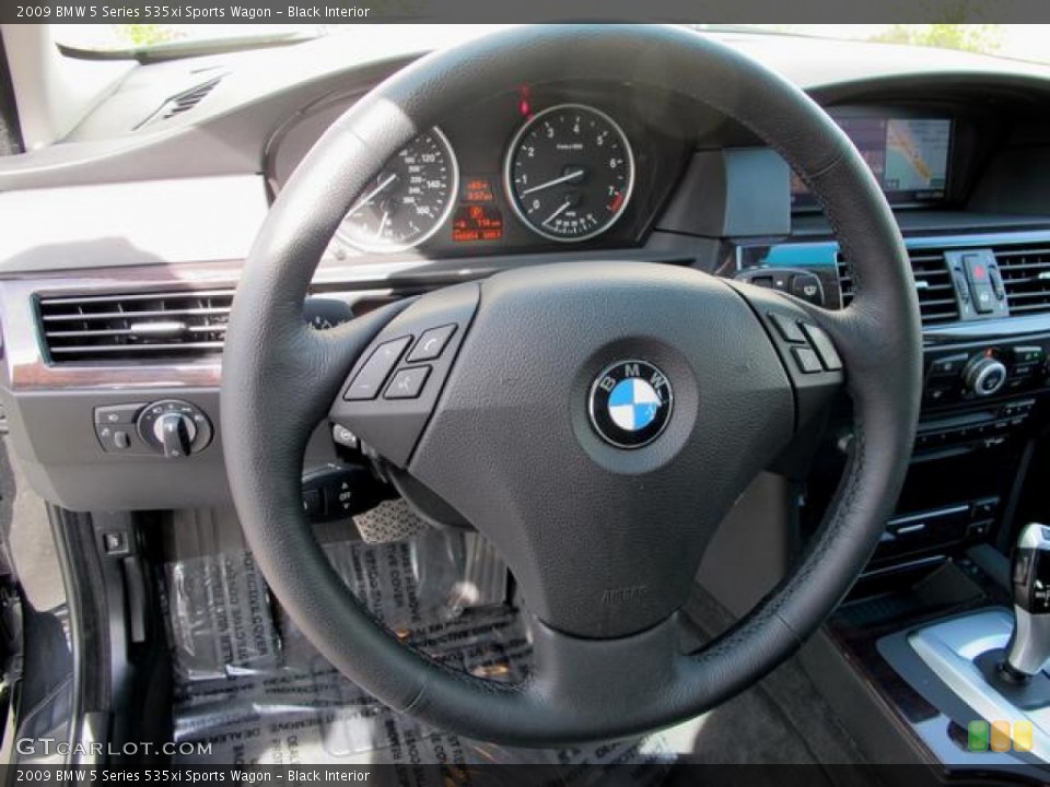 Black Interior Steering Wheel for the 2009 BMW 5 Series 535xi Sports Wagon #63068692