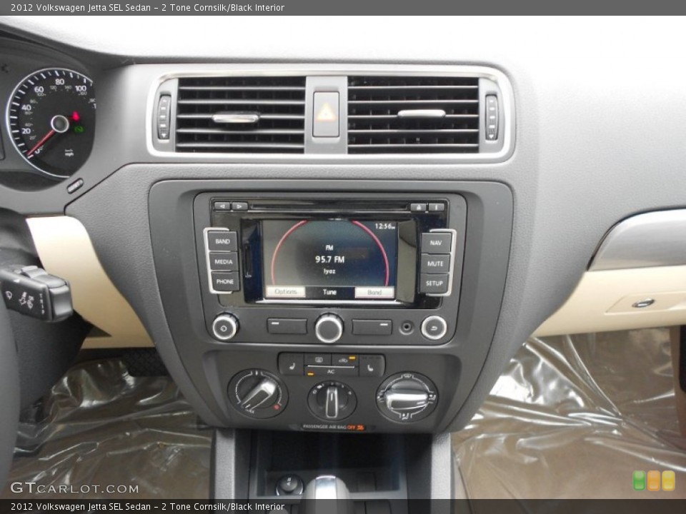2 Tone Cornsilk/Black Interior Controls for the 2012 Volkswagen Jetta SEL Sedan #63083726