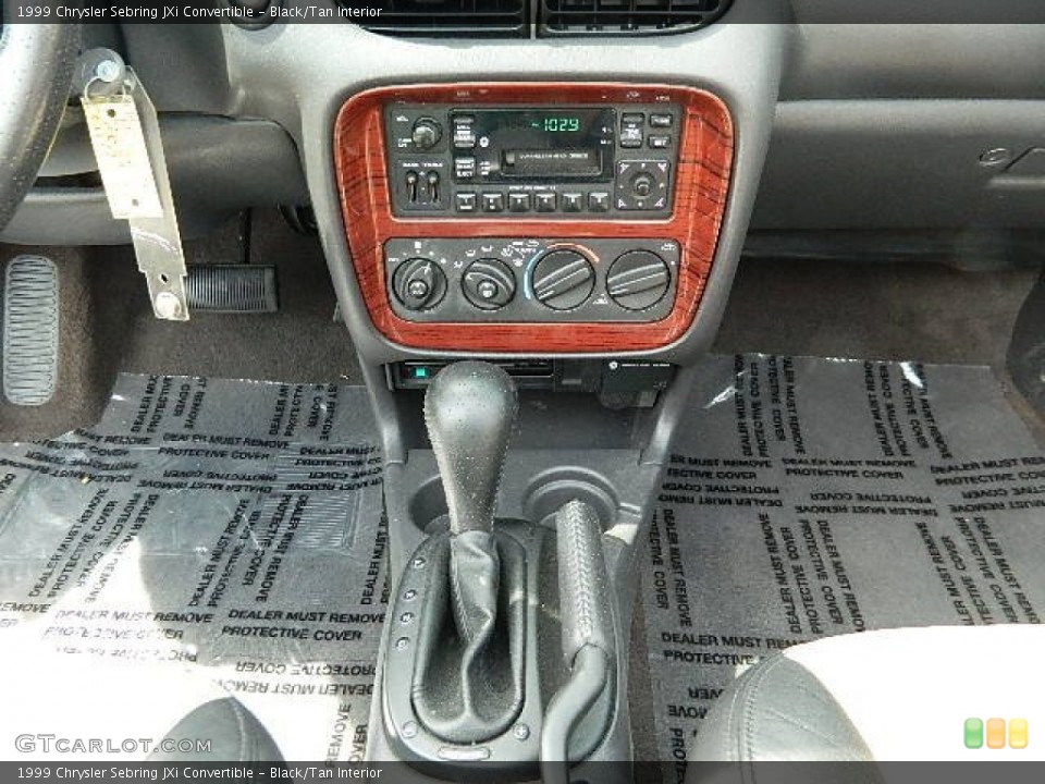 Black/Tan Interior Controls for the 1999 Chrysler Sebring JXi Convertible #63096197