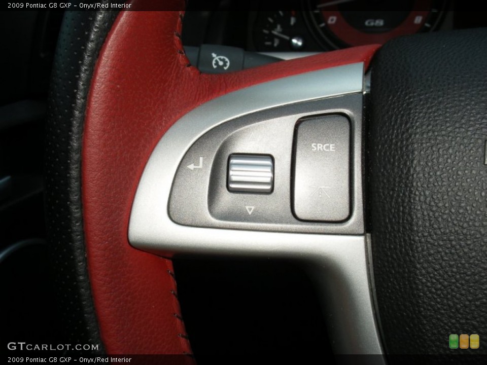 Onyx/Red Interior Controls for the 2009 Pontiac G8 GXP #63120389
