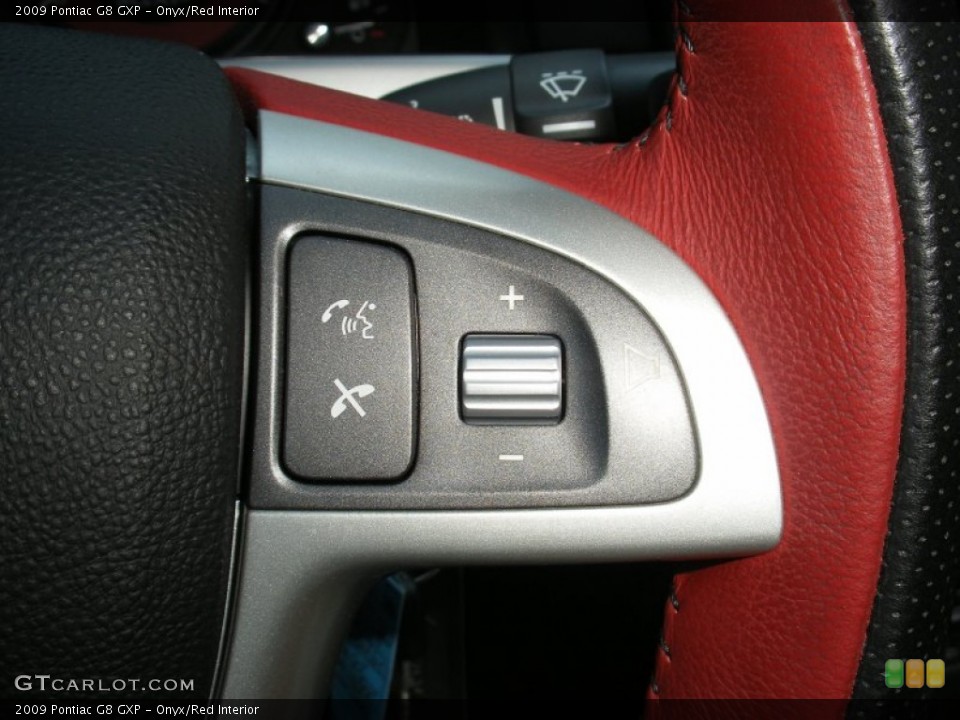 Onyx/Red Interior Controls for the 2009 Pontiac G8 GXP #63120398