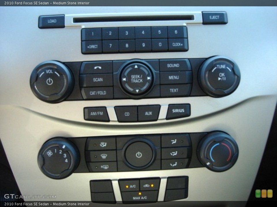 Medium Stone Interior Controls for the 2010 Ford Focus SE Sedan #63130667