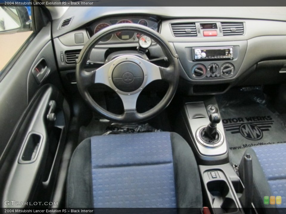 Black Interior Dashboard for the 2004 Mitsubishi Lancer Evolution RS #63180571