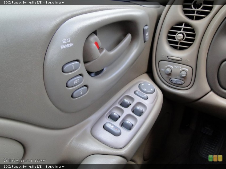 Taupe Interior Controls for the 2002 Pontiac Bonneville SSEi #63192211