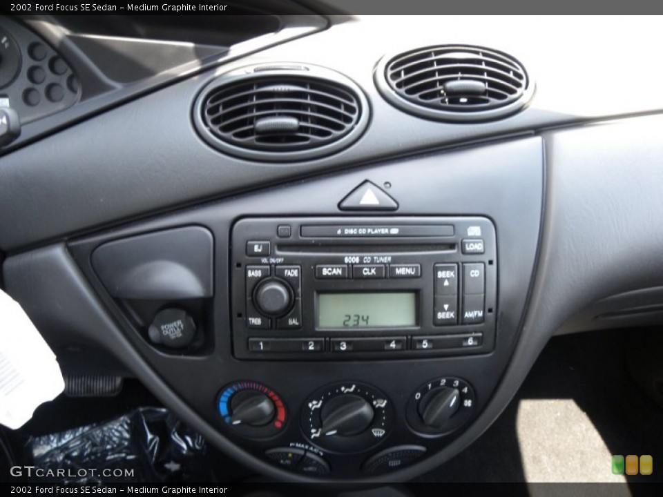 Medium Graphite Interior Controls for the 2002 Ford Focus SE Sedan #63215234